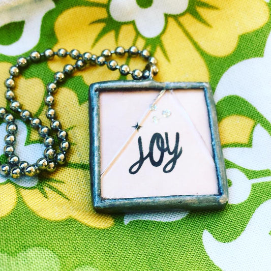 Joyful necklace, pray, broken